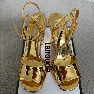 BRAND NEW, in box, Laroude “Yves” gold wedges. Women’s size 8.5